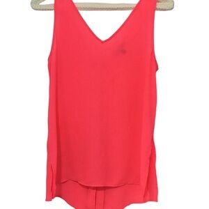 Hot pink blouse with side slits and ties on back